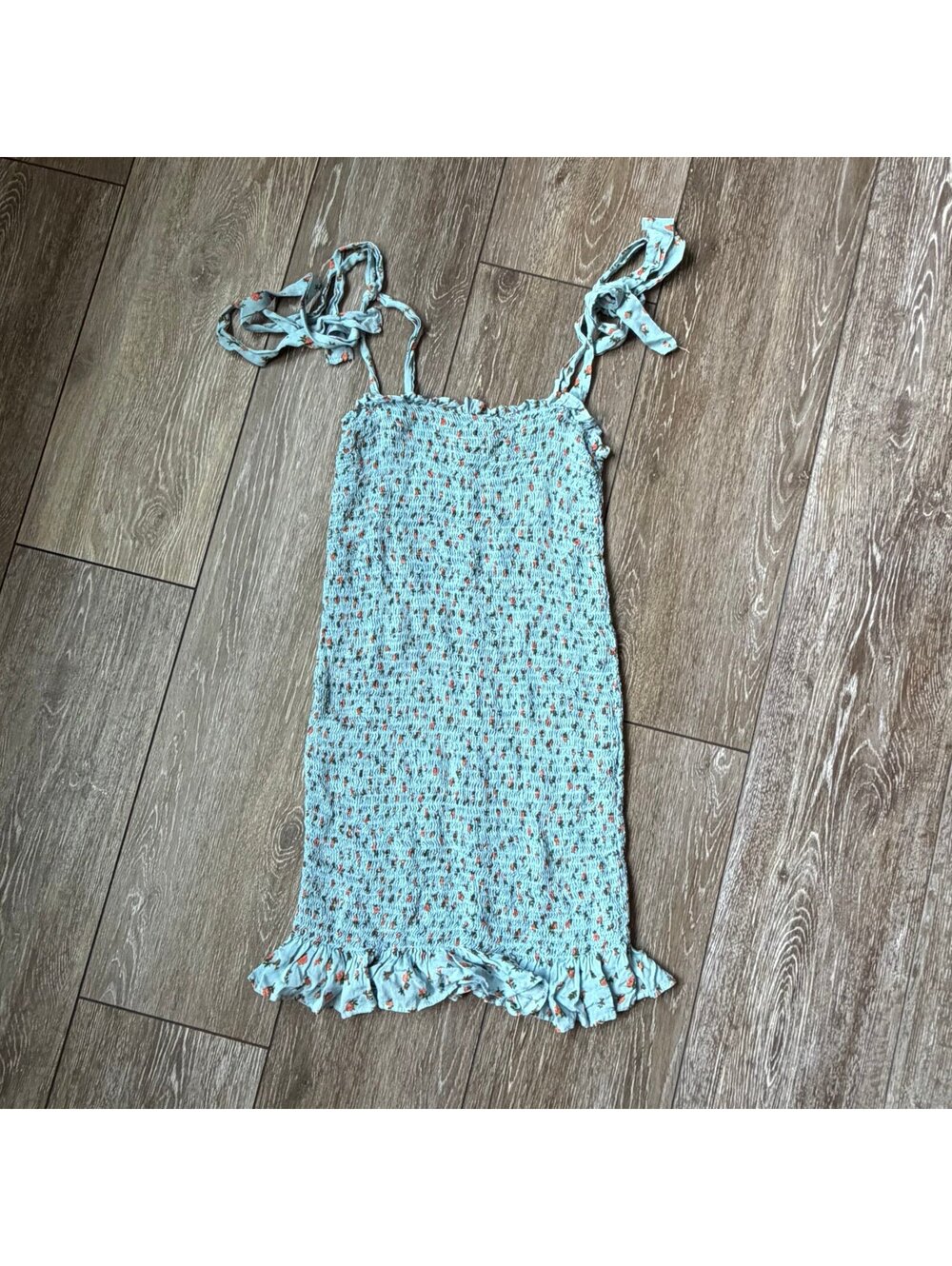 Smocked floral Free People dress with ruffle hem and tie straps